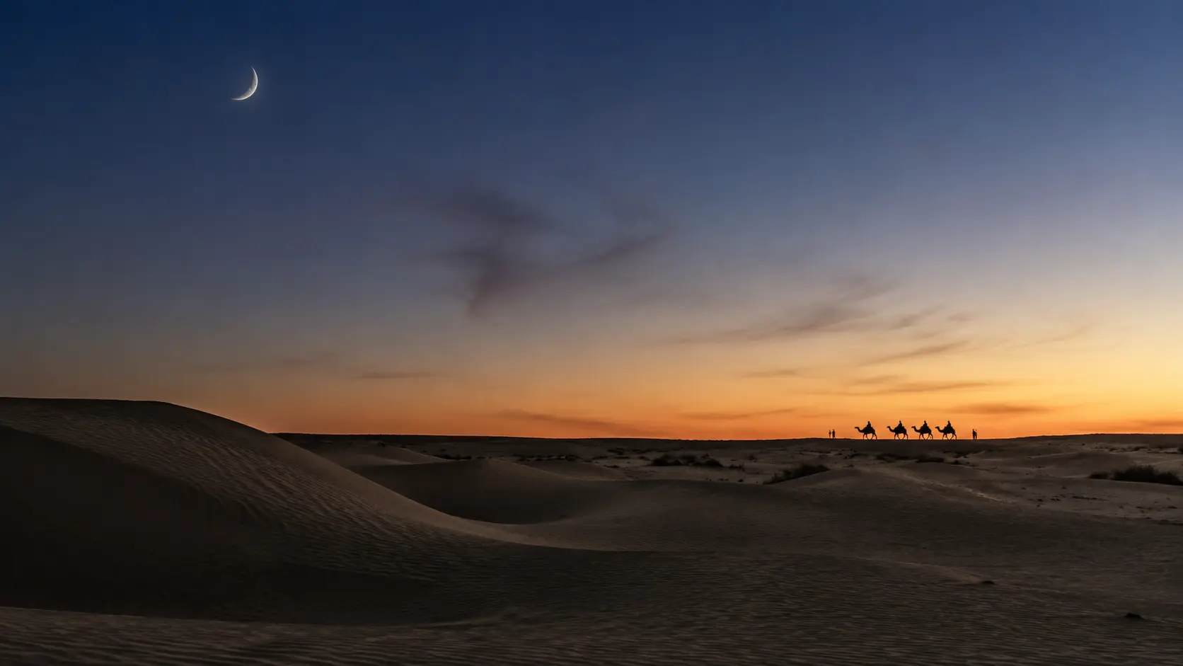 Editorial view of the Thar Desert as sunset moves into blue hour